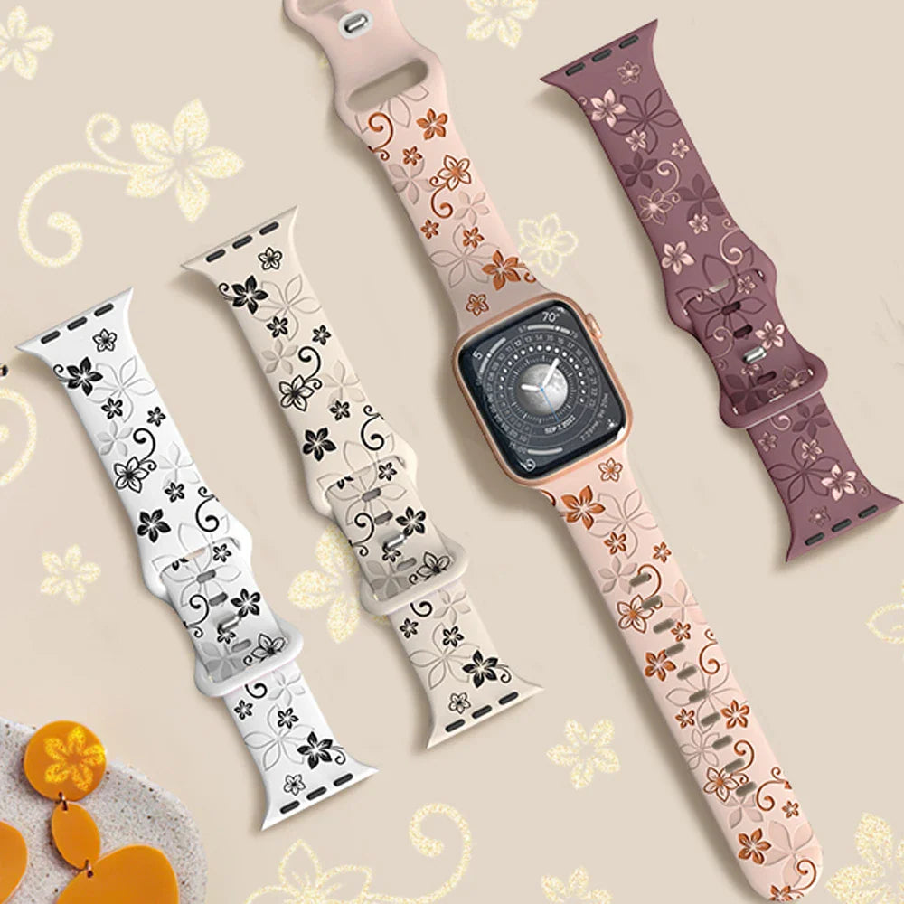 A collection of floral engraved silicone watch bands in different colors