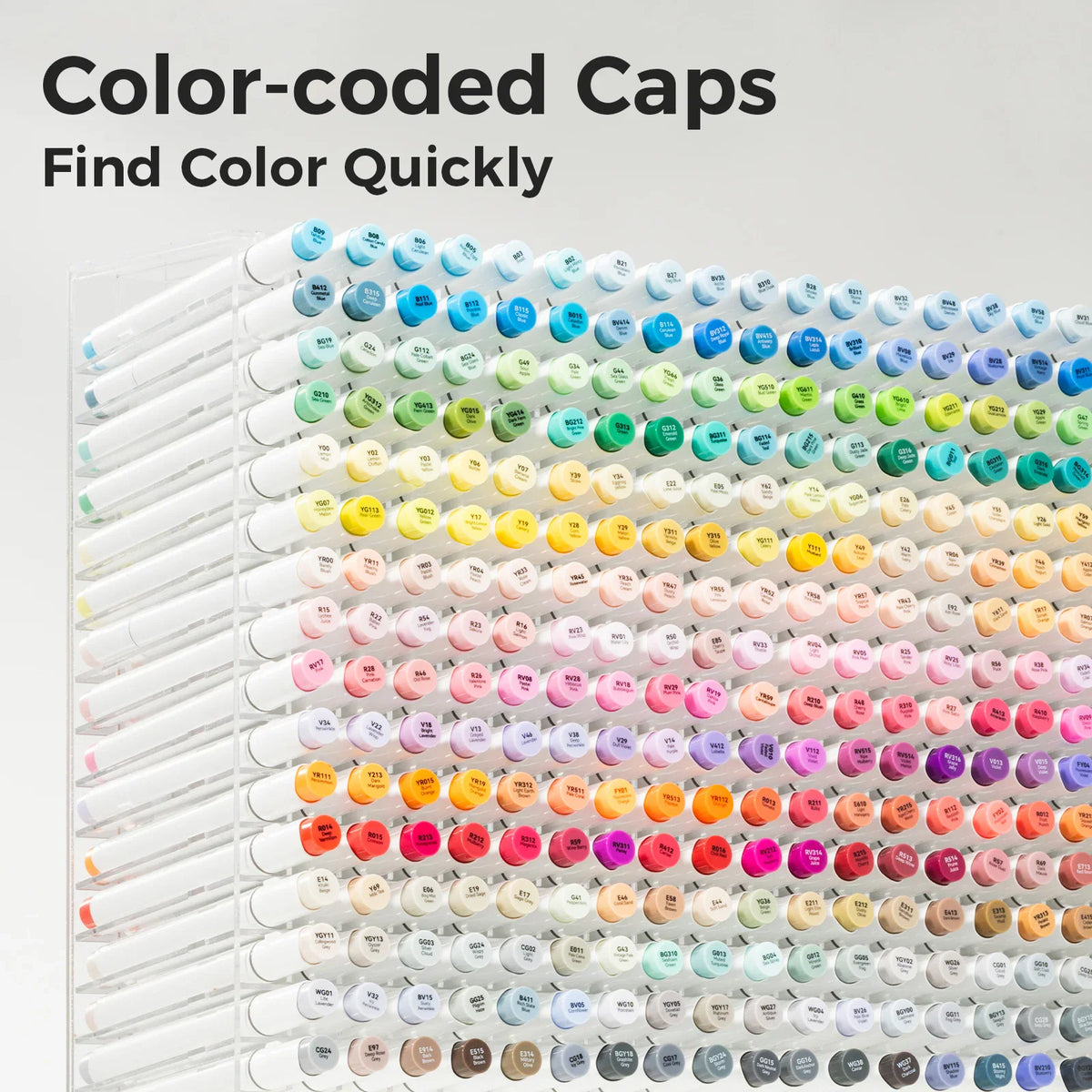 Large set of dual-tip markers with color-coded caps displayed in a stand