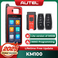 Handheld key programming tool with red and black casing, two remote keys, and diagnostic adapter
