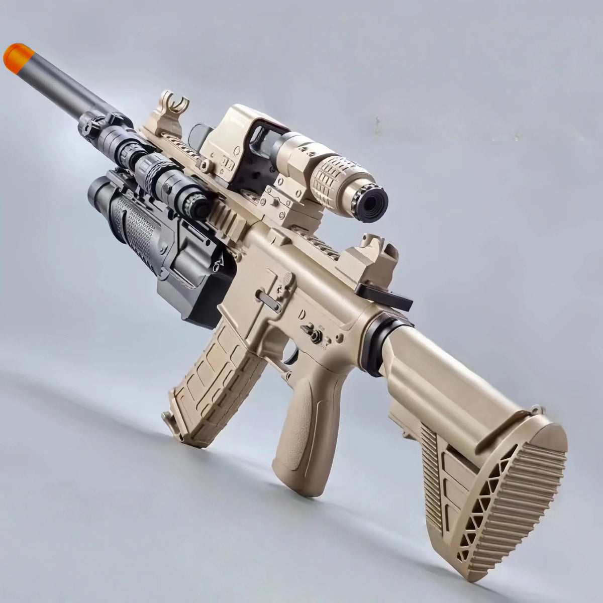 Tan M416 gel blaster toy with tactical scope and accessories viewed from the side.