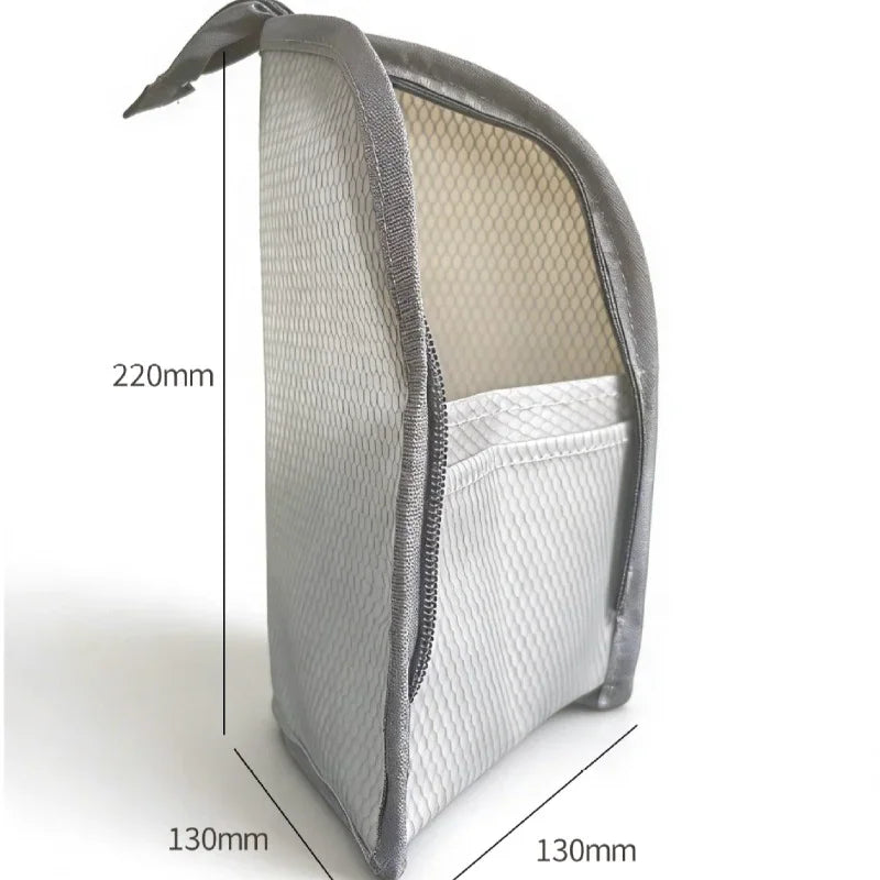 A grey mesh standing toiletry bag with dimension annotations shown on a white background.