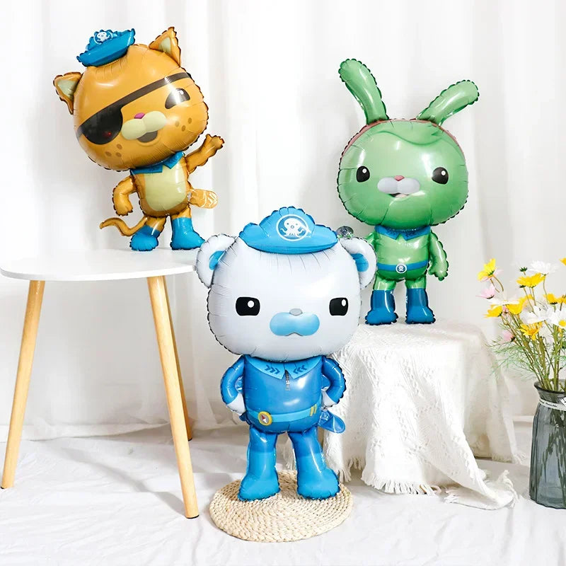 Three Octonauts character foil balloons on a white table