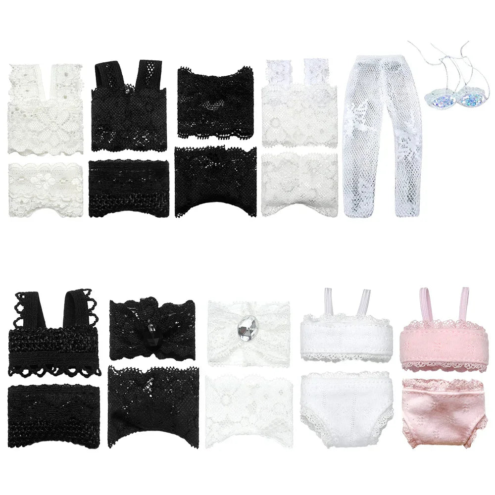 A collection of various lace doll underwear sets in different colours.