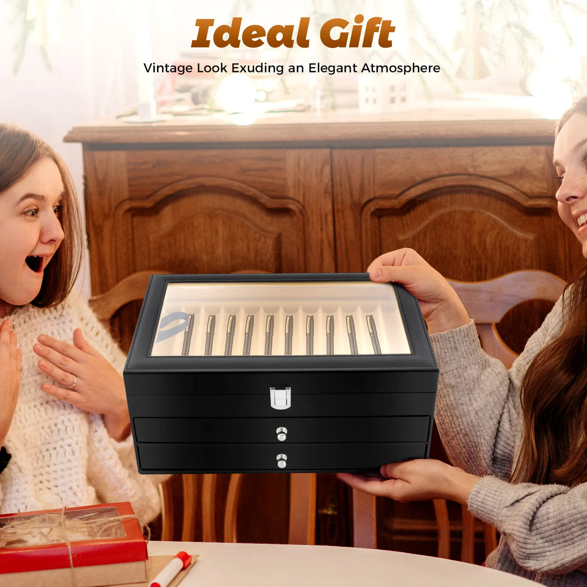 Person holding a black 36-slot pen display case as a gift.