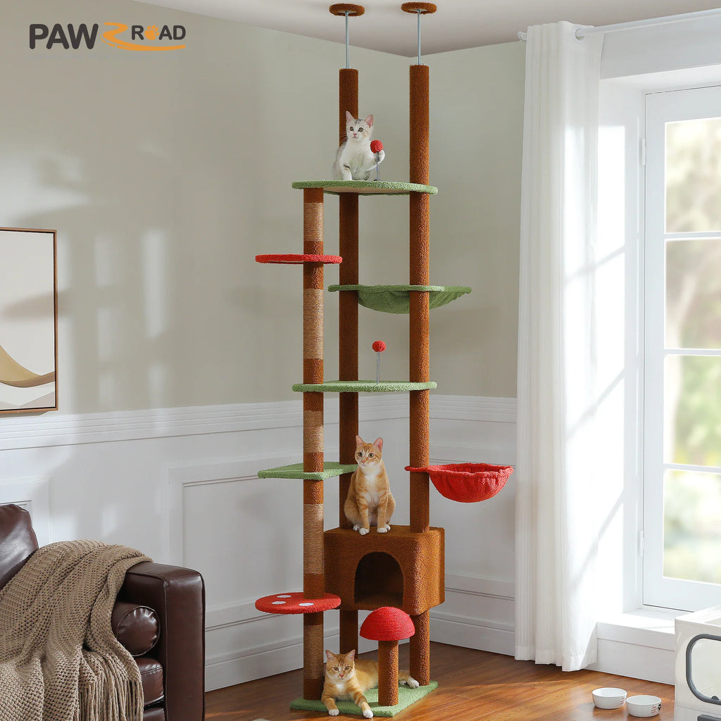 Floor-to-ceiling multi-level cat tree with mushroom-themed platforms and a cozy condo in a living room.