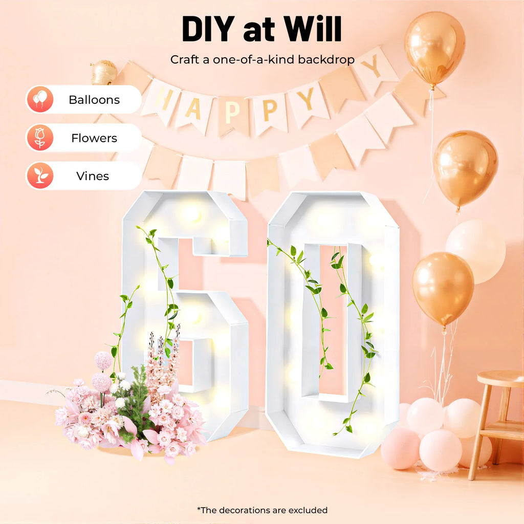 White light-up number 60 decorated with vines and flowers for a birthday party