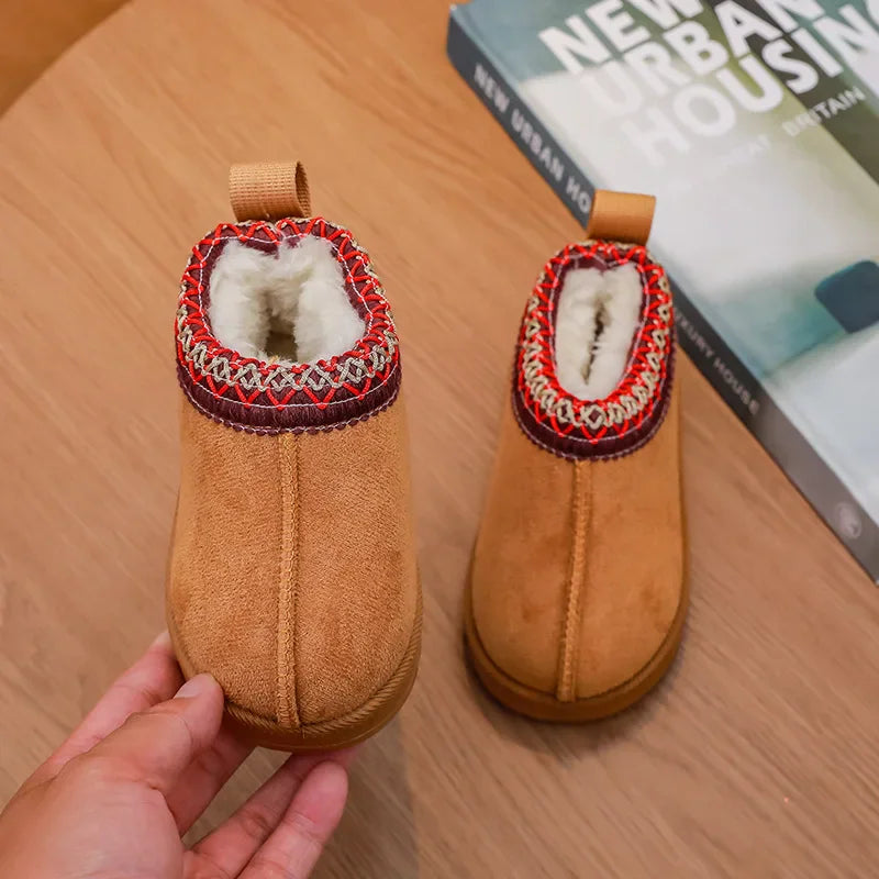Pair of brown children's ankle boots with red patterned embroidered collar and fur lining