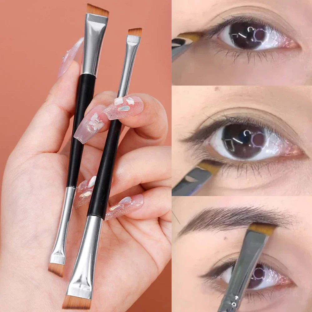 Close-up of double-ended angled makeup brushes held in hand and in use on eyes