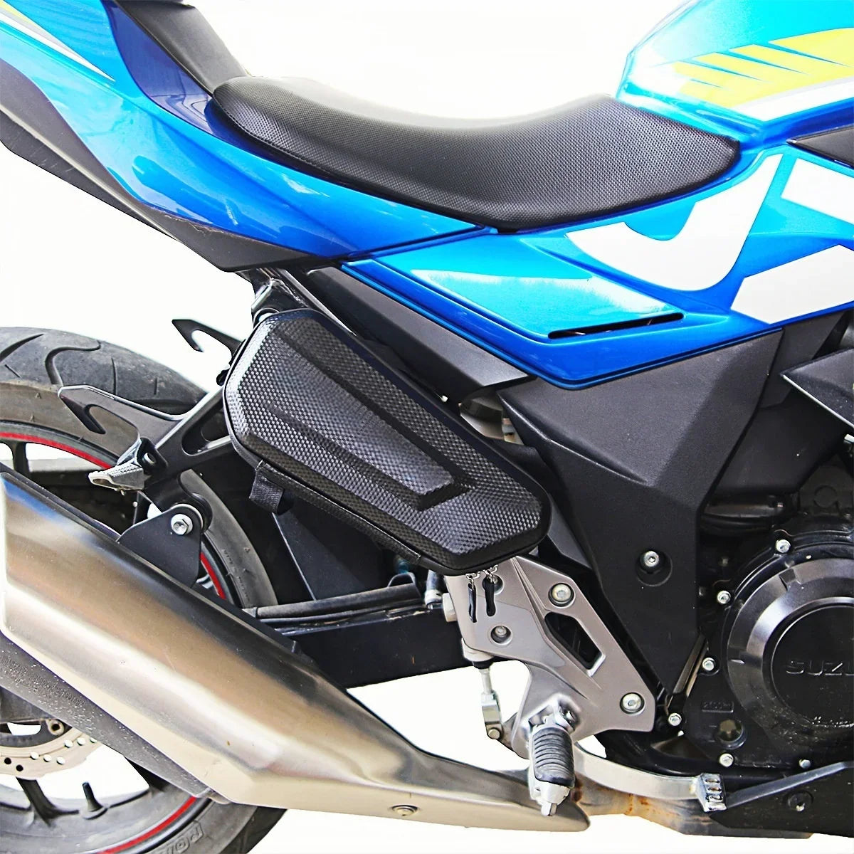 Side view of a compact black waterproof motorcycle bag attached to a sport bike