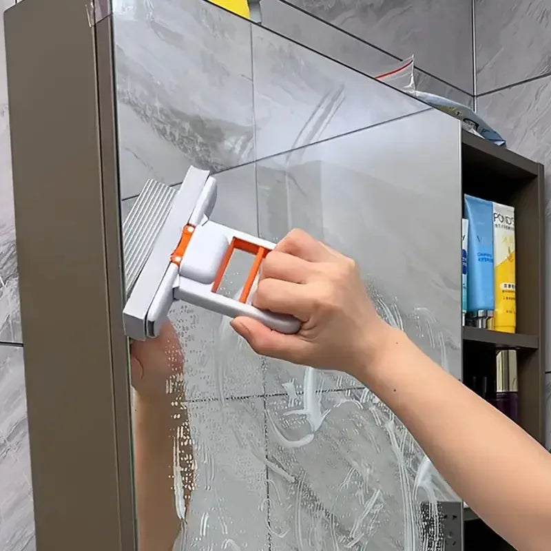 Handheld mini mop cleaning a bathroom mirror