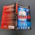 The front and back cover of the book The Coworker by Freida McFadden.