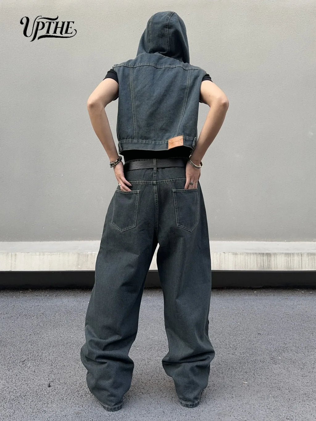 Back view of dark grey baggy wide leg denim jeans