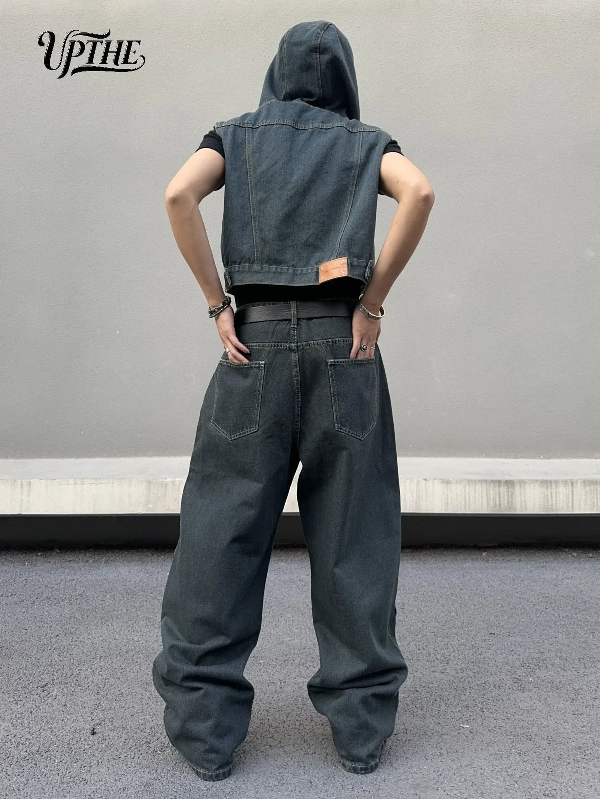 Back view of dark grey baggy wide leg denim jeans