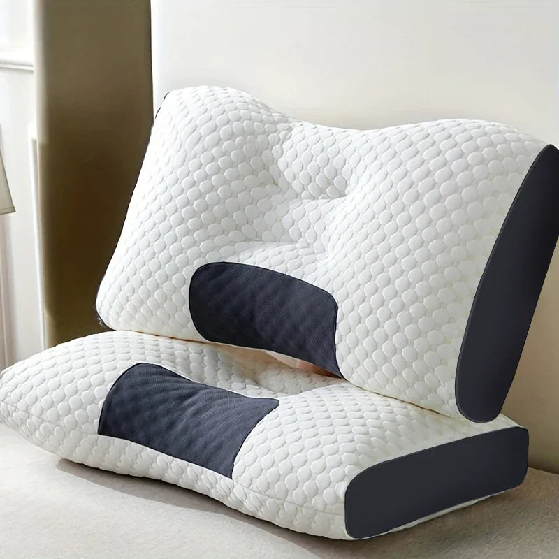 One white and grey ergonomic orthopedic contour pillow positioned upright