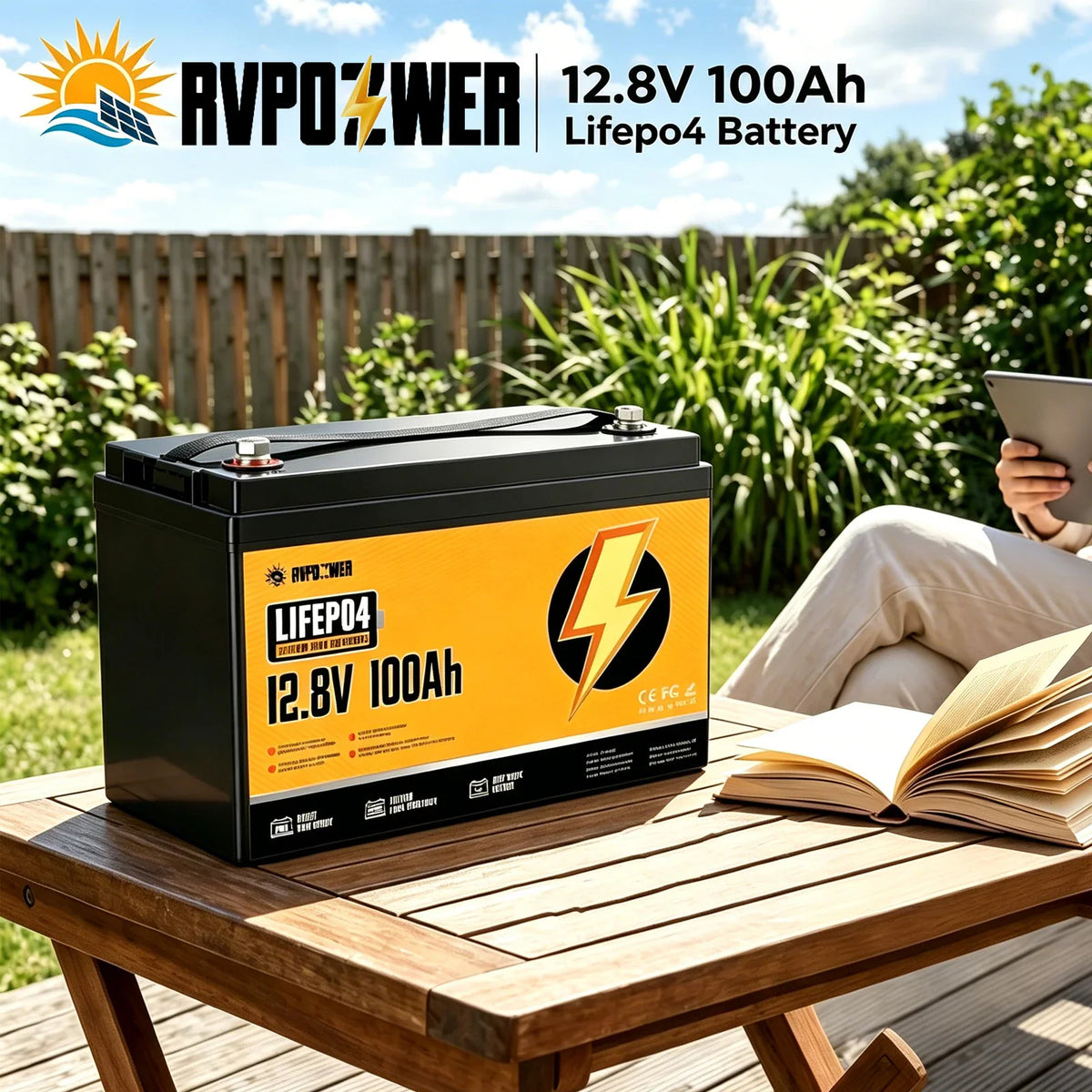 12.8V 100Ah LiFePO4 battery on a wooden table in a yard