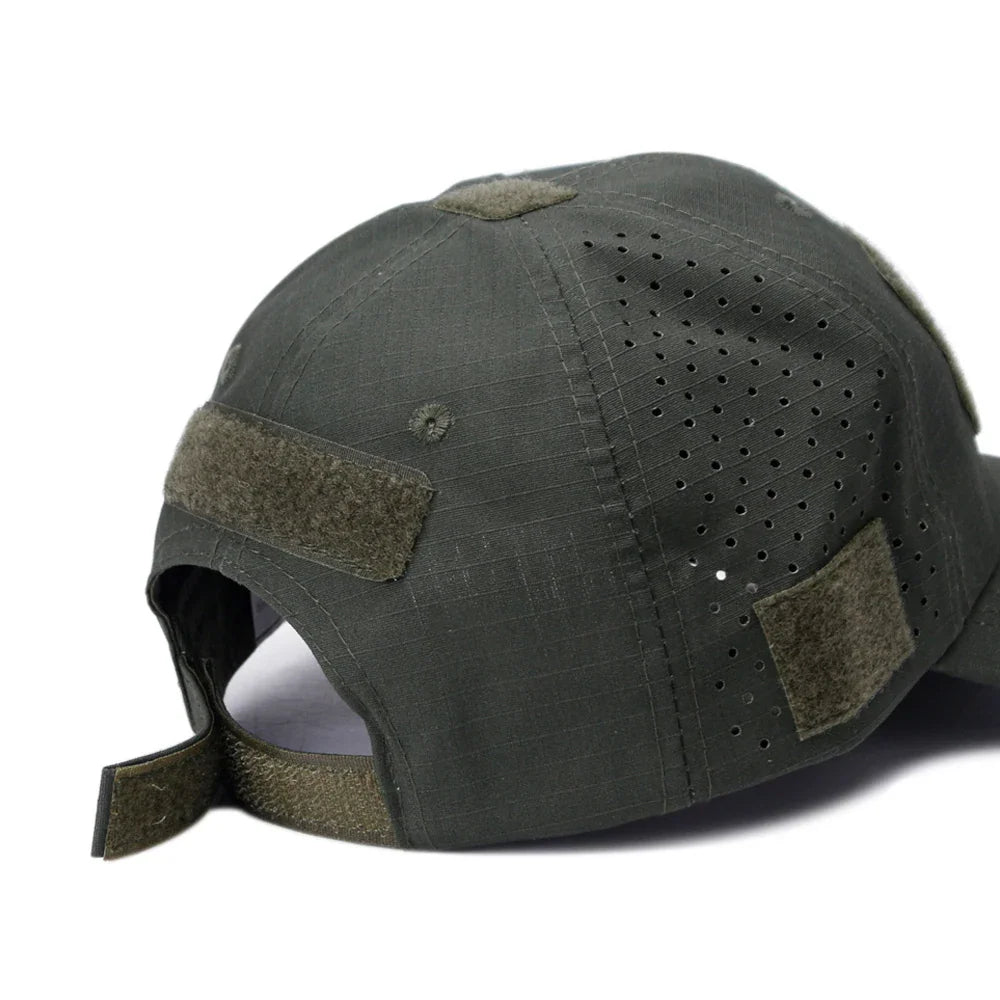 Rear view of an olive green tactical baseball cap with adjustable velcro strap