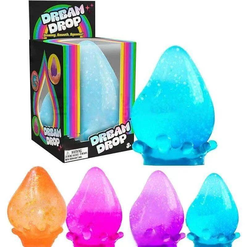 A blue glittery water-drop squishy toy next to its retail box with other colored squishy toys below