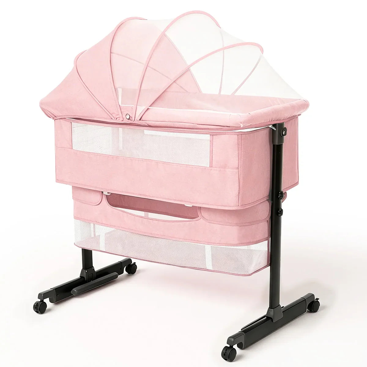 Pink portable baby bedside bassinet with mosquito net canopy and storage rack on wheels