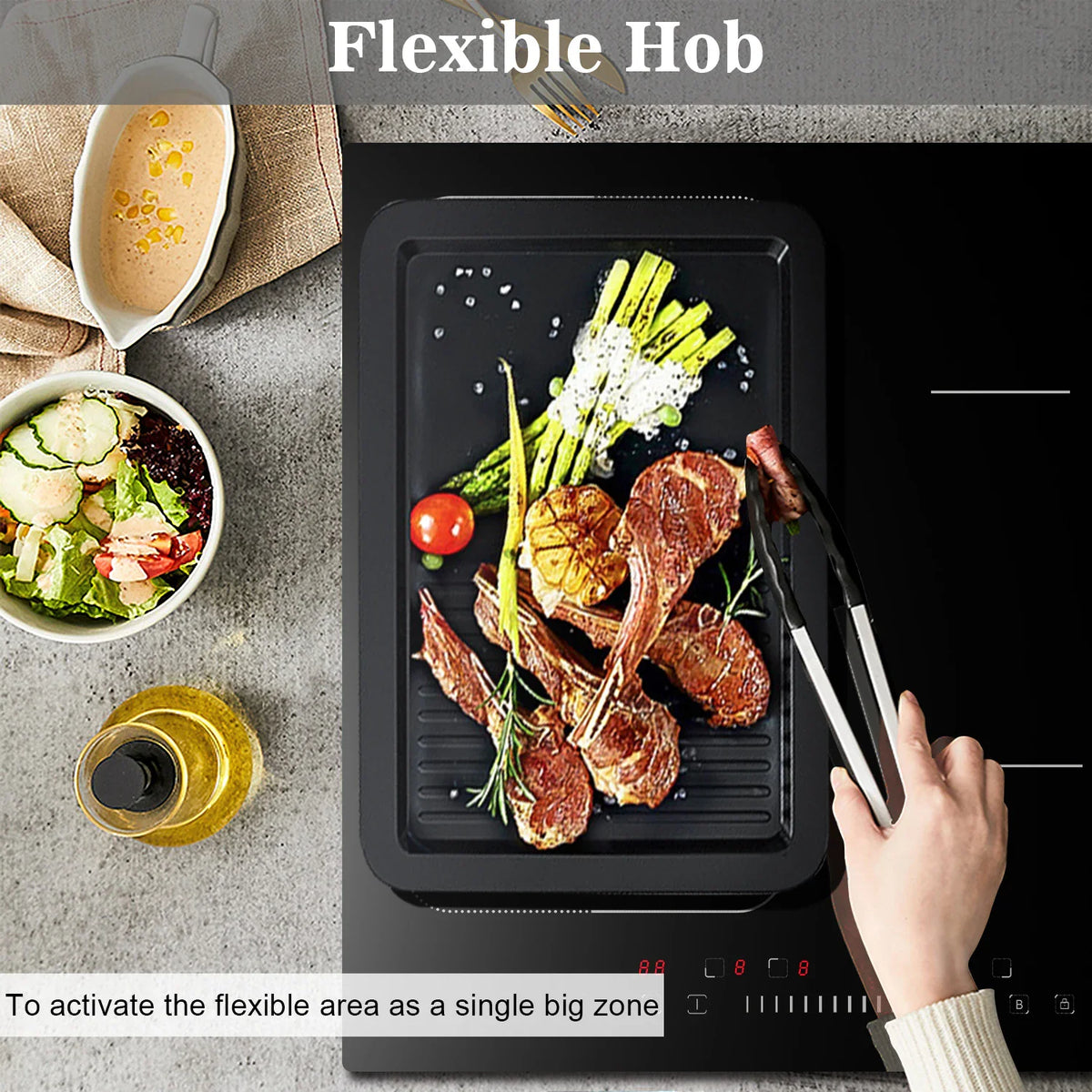 Black induction cooktop with a griddle pan, cooking lamb chops and vegetables.