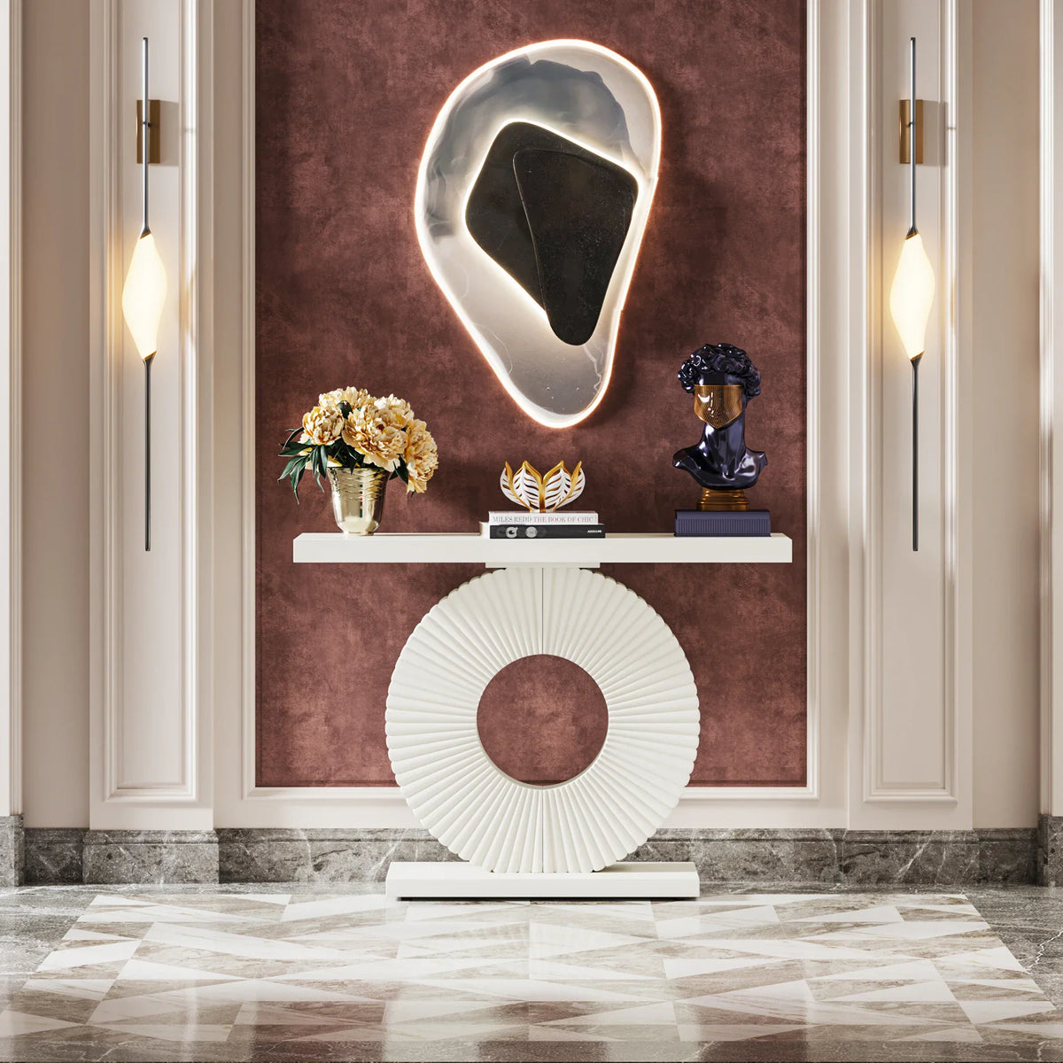 Modern white console table with a circular fluted base in a hallway with wall lighting
