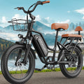 Black fat tire electric bike with front basket and rear passenger seat against a scenic landscape background