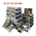 A collection of various metal-cased voltage power supply units for LED lighting