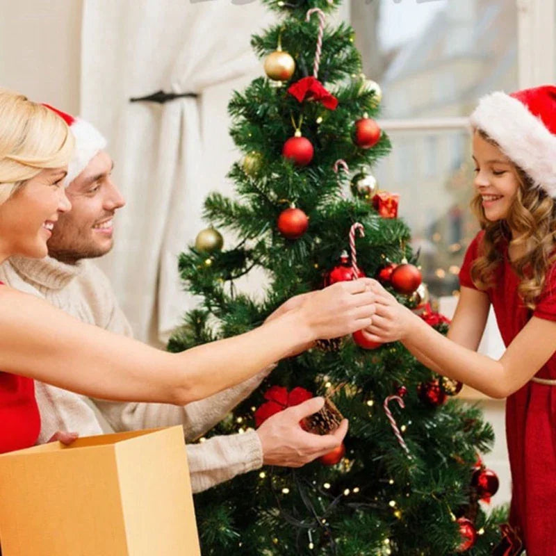 A family decorating a Christmas tree together