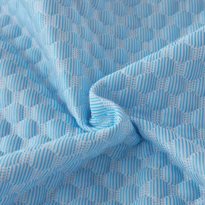 Folded blue and white honeycomb texture fabric material