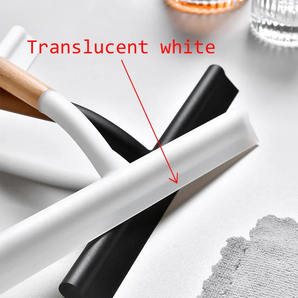 Close up of a white silicone window wiper with a wooden handle