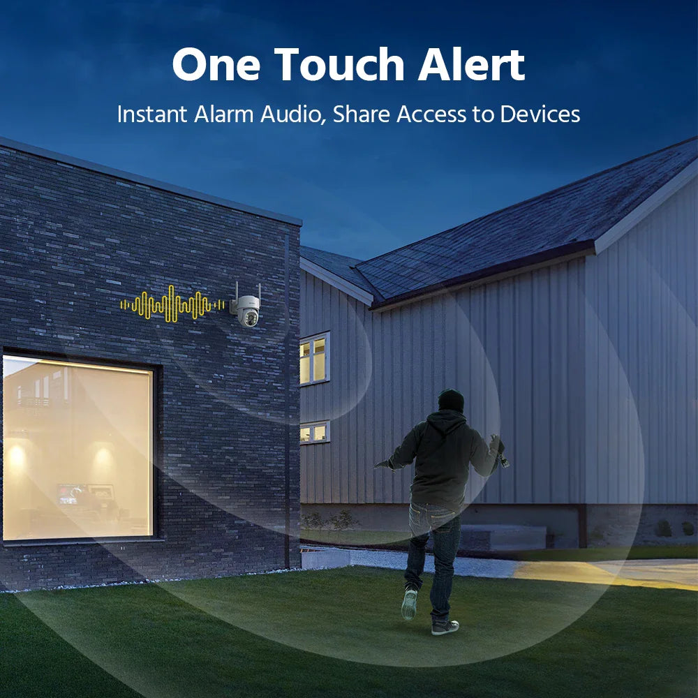 A security camera mounted on a brick house exterior at night