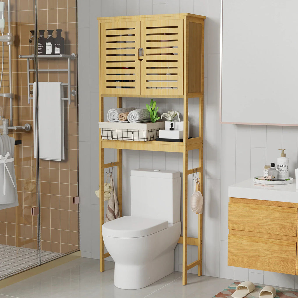 Bamboo over-the-toilet storage cabinet with two cupboard doors and open shelf in a bathroom setting.