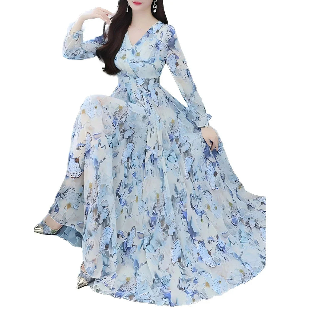 Long sleeve maxi dress with blue butterfly print and v-neck on white background