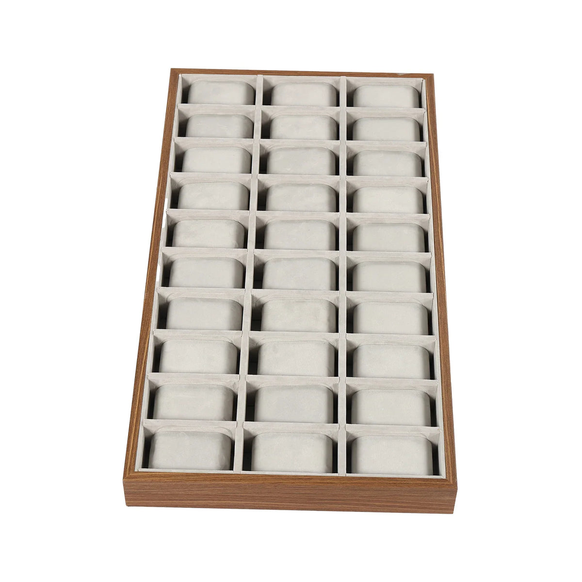 Empty 30-slot wooden watch display tray from top view