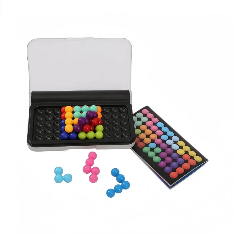 3D ball puzzle game board, extra pieces, and a colorful puzzle solution card