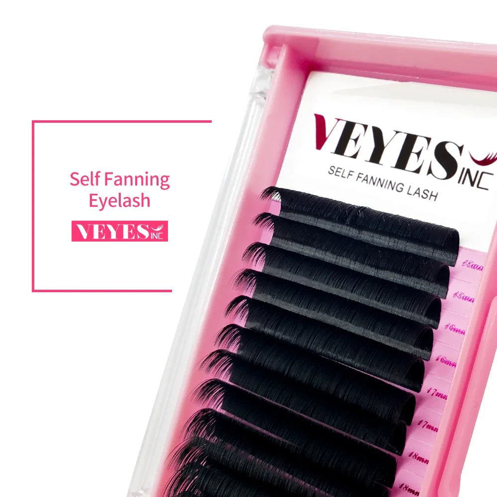 Tray of self-fanning eyelash extensions in a pink case