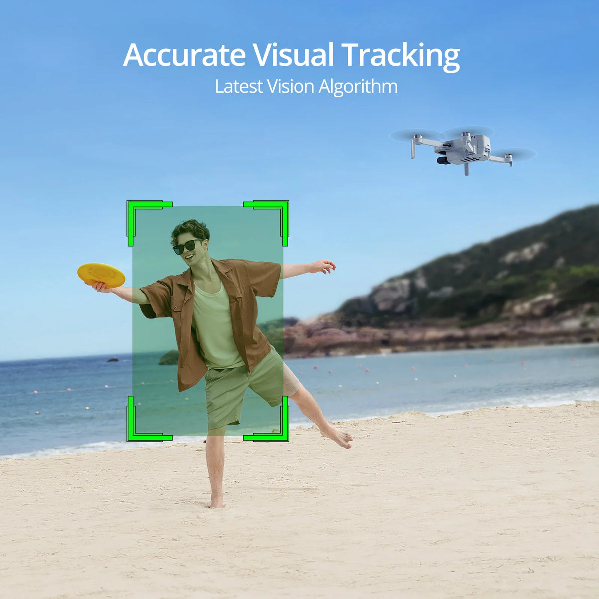 Drone camera tracking a person playing with a flying disc on a beach