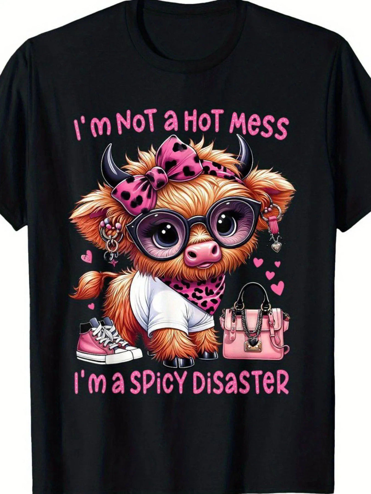 Black t-shirt with a cartoon Highland cow wearing glasses, a leopard print bow, and sneakers, with hearts and text