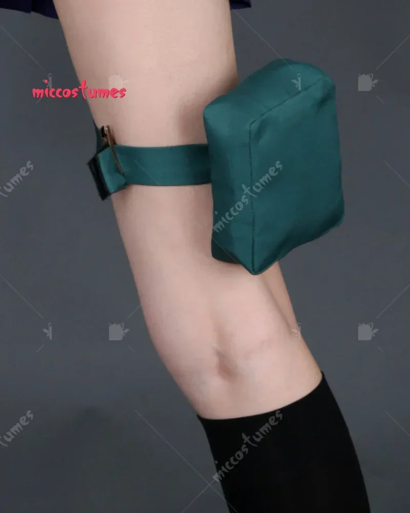 Detail of green accessory pouch on a leg strap for cosplay costume