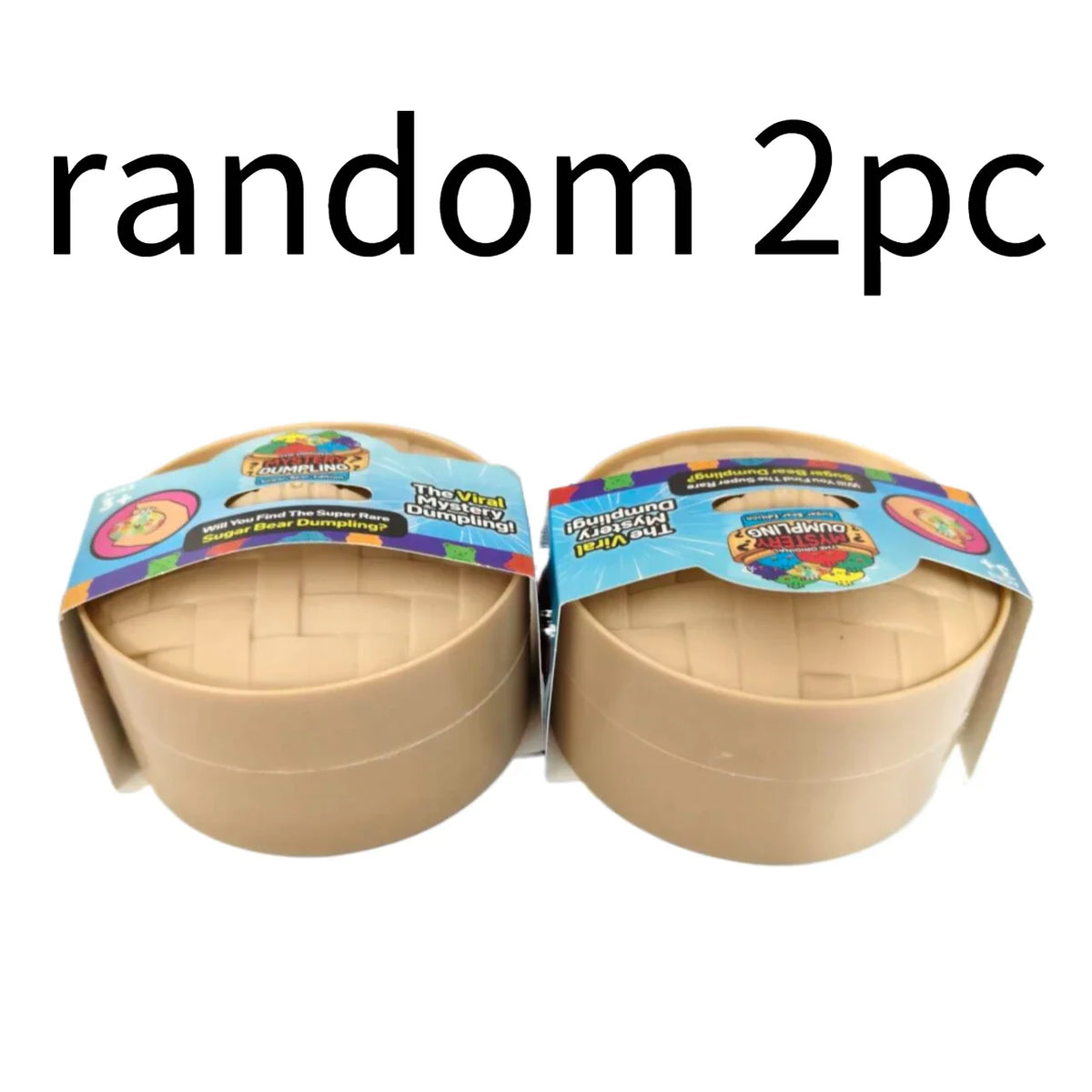 Two toy surprise dumpling boxes in bamboo-style containers