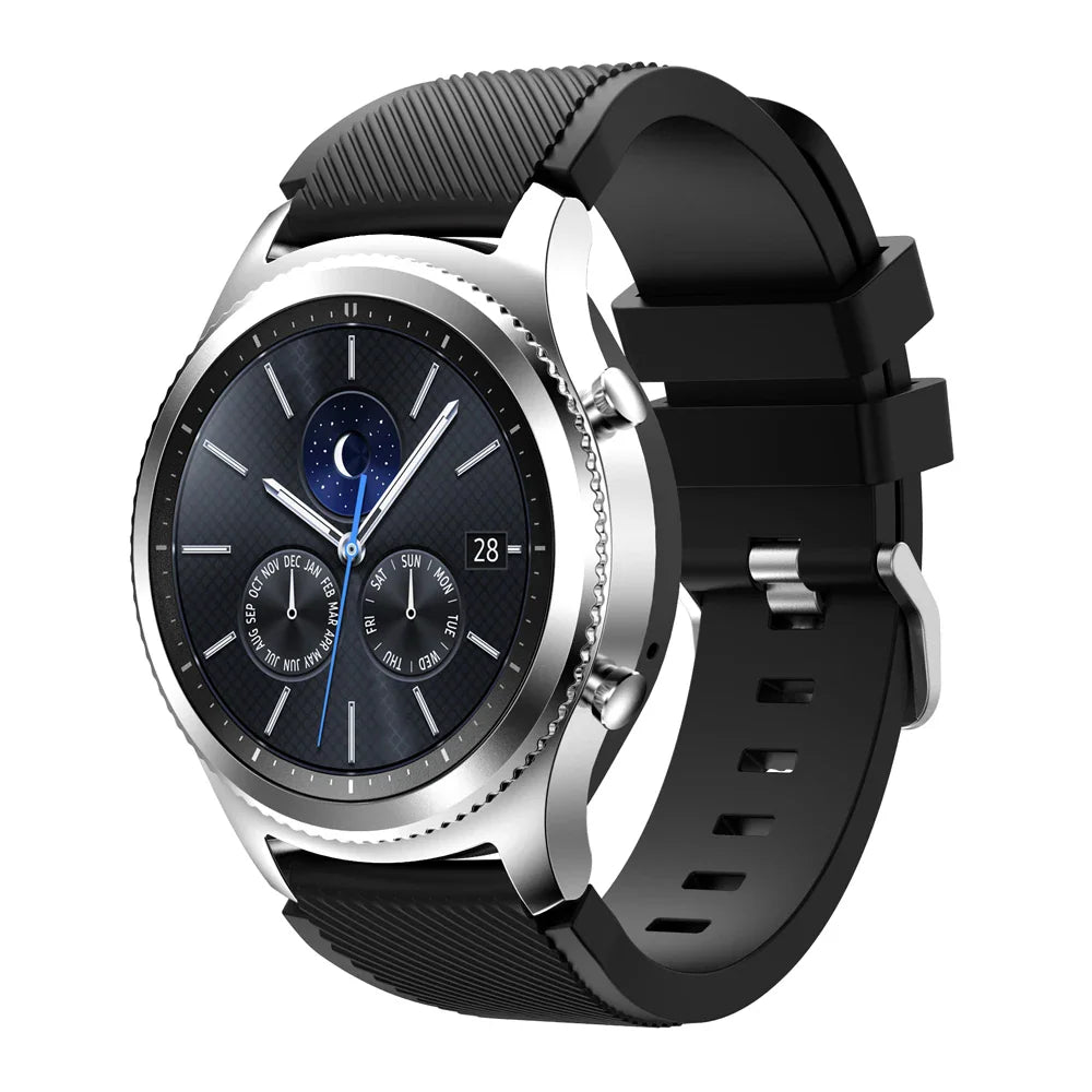 A black silicone sport watch band attached to a digital smartwatch with a silver metallic case.