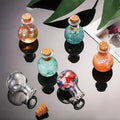 Small round glass bottles with cork stoppers containing colourful glitter and confetti