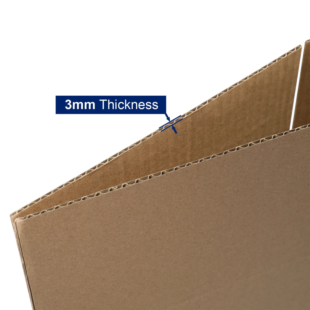 Close-up of brown corrugated cardboard showing a 3mm thickness measurement