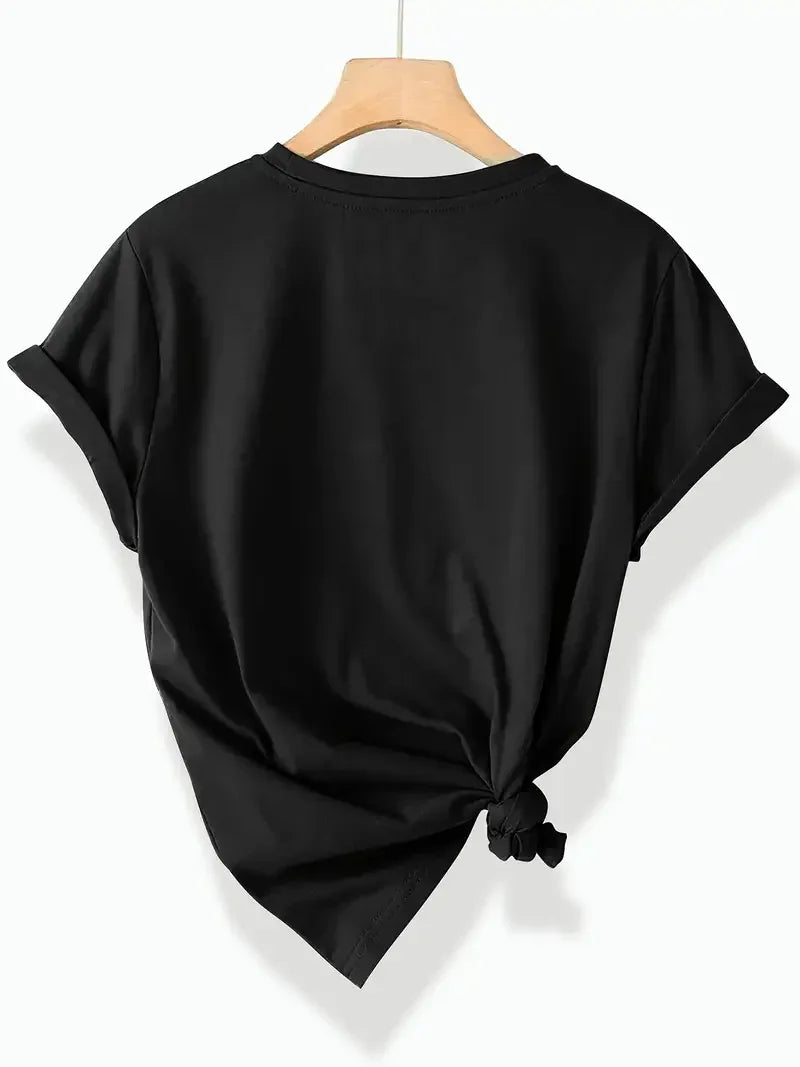 Back view of a black T-shirt with a tie detail on the hem on a clothes hanger