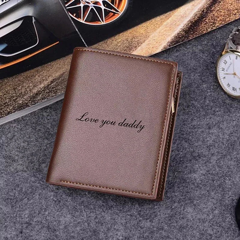 Brown leather wallet engraved with Love you daddy text