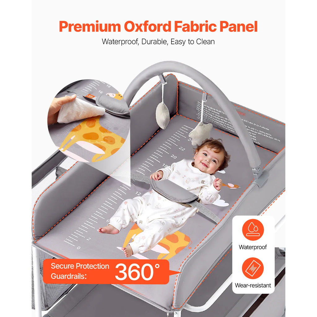 Top view of a baby changing table with giraffe pattern and a baby lying down