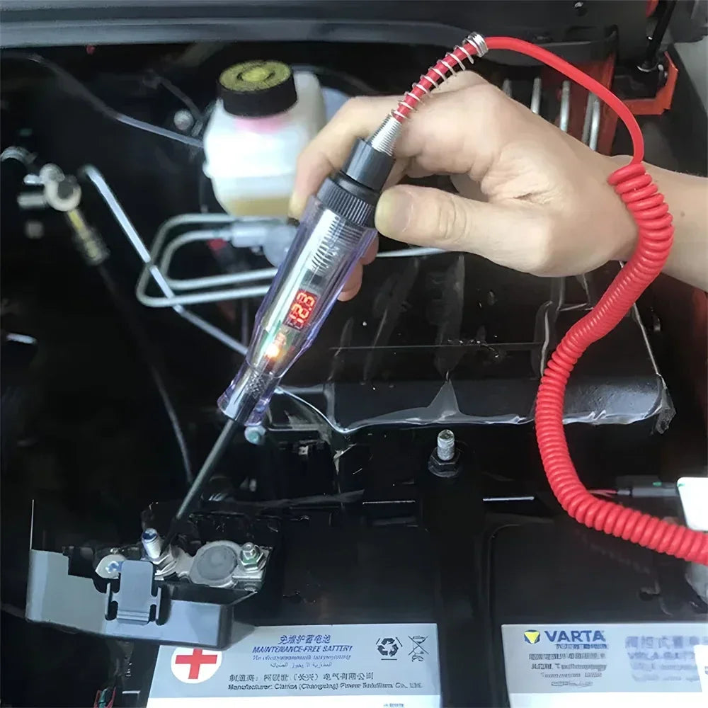 Hand using a digital automotive circuit tester to check a car battery