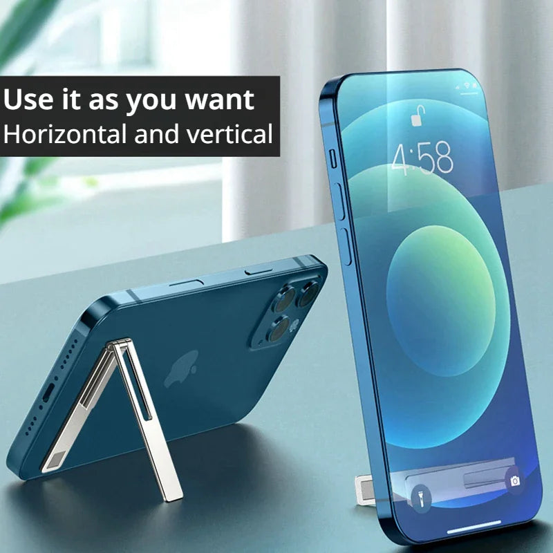 A foldable metal phone stand used to prop up a smartphone in both landscape and portrait orientations.