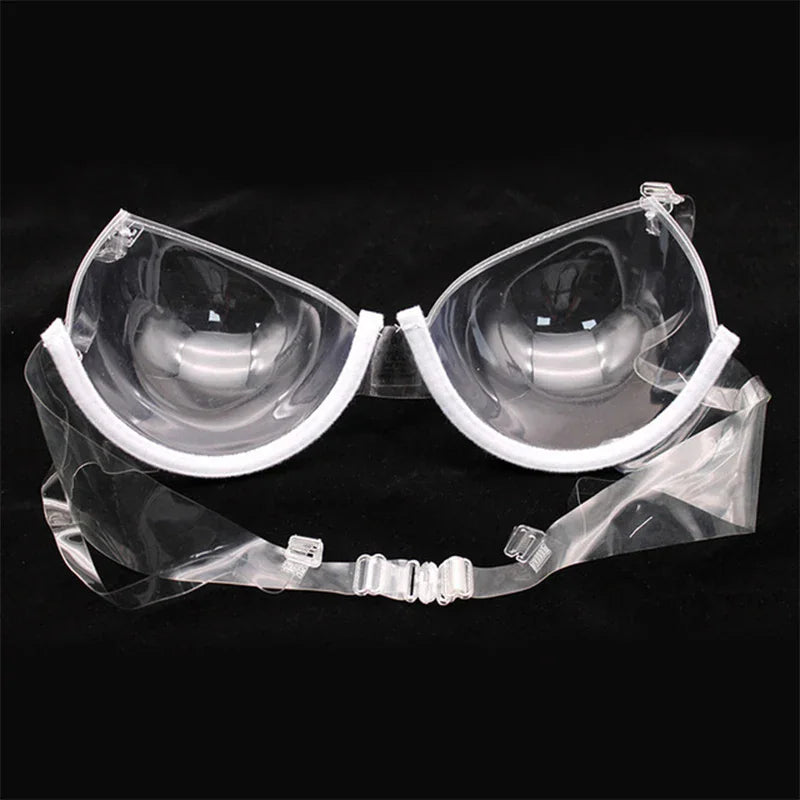 Transparent plastic bra with white trim and clear adjustable straps.