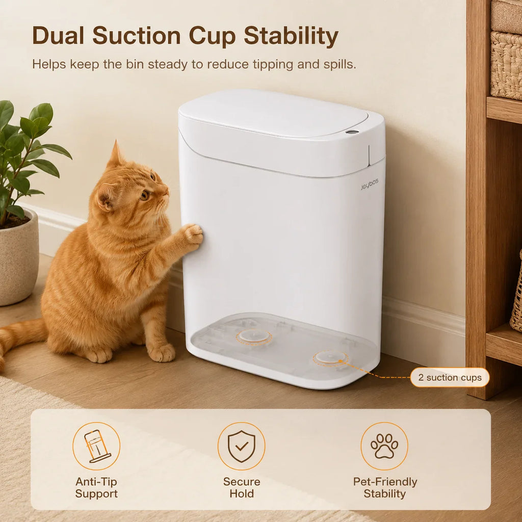 White smart trash can with suction cup stability base next to a cat