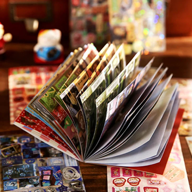A fan of decorative stationery sticker sheets with various food and drink designs